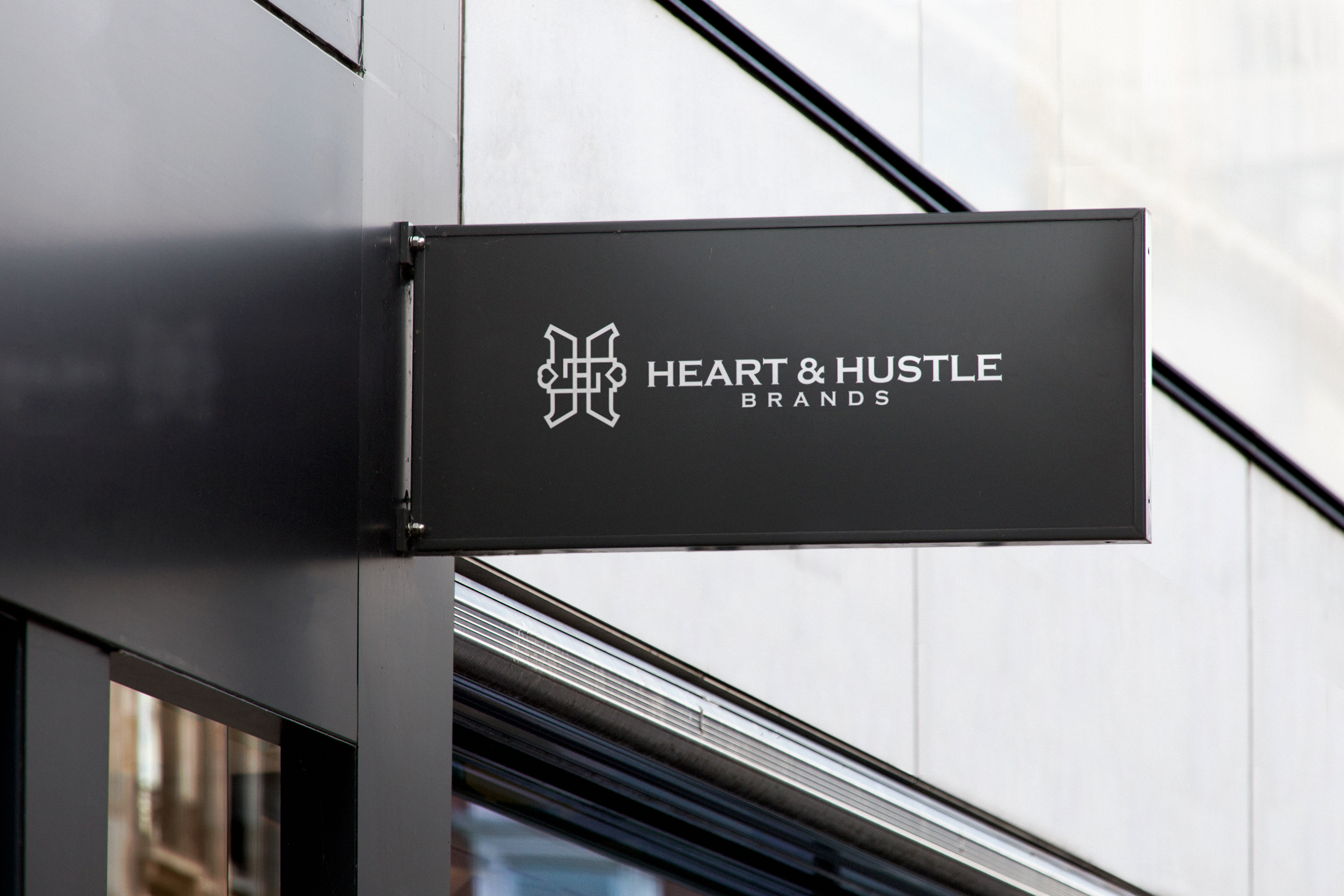 Heart & Hustle Brands sign